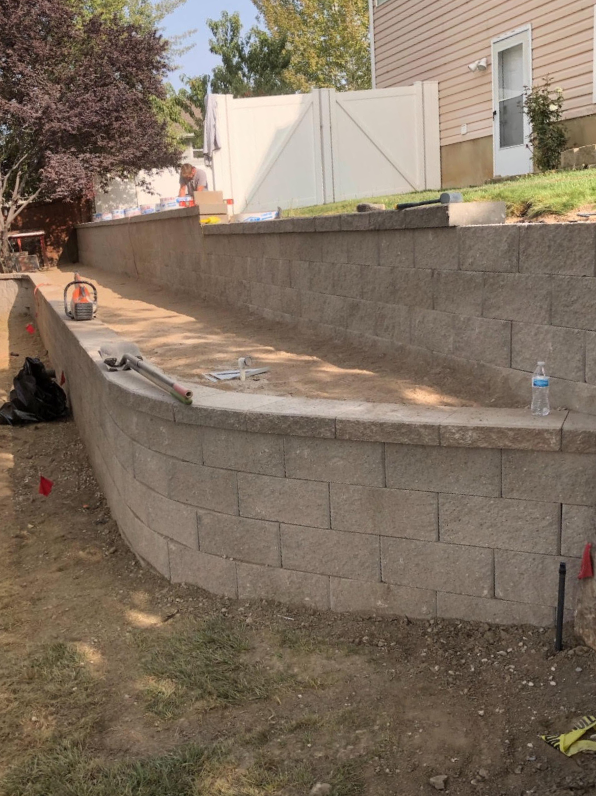 Outdoor Curved Cinderblock Retaining Wall